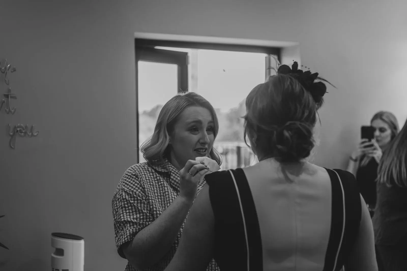 Bridesmaid preparing in black and white