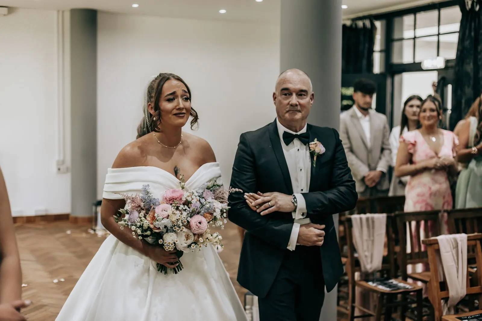 Bride walking in on her father's arm